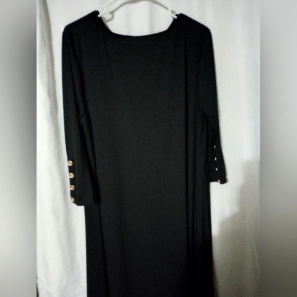 Elegant Black Dress with Button Detail